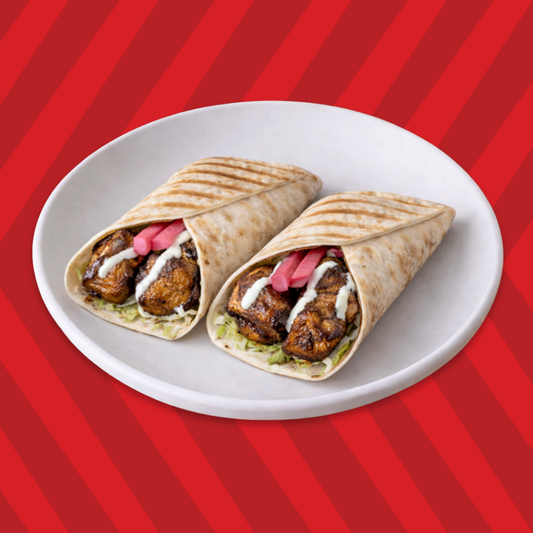 Beef kebab wrap with onions, pickles and sauce