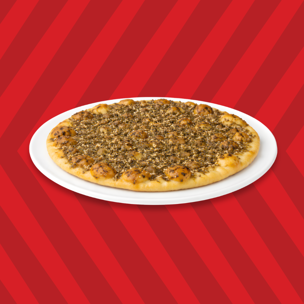 Lebanese fatayer pie baked on a flatbread crust with zaatar spice