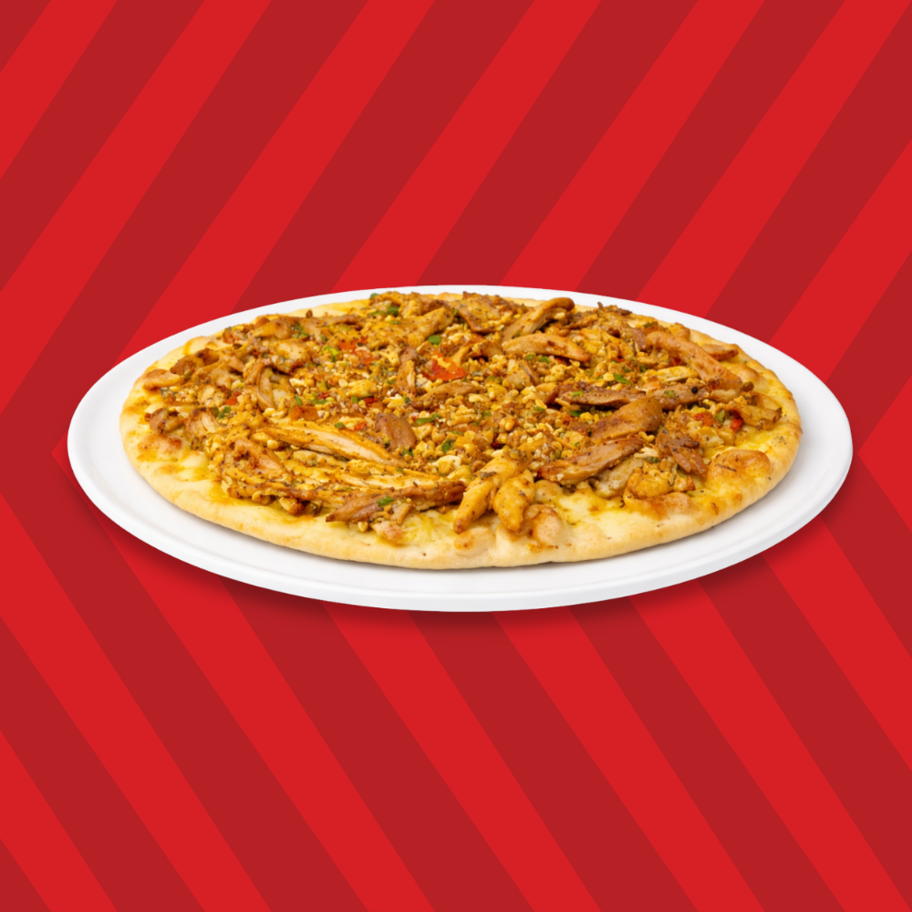 Basha chicken pie topped with seasoned chicken and herbs