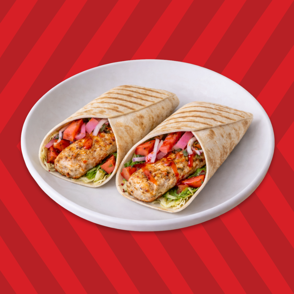 Chicken kefta kebab wrap with seasoned filling and veggies