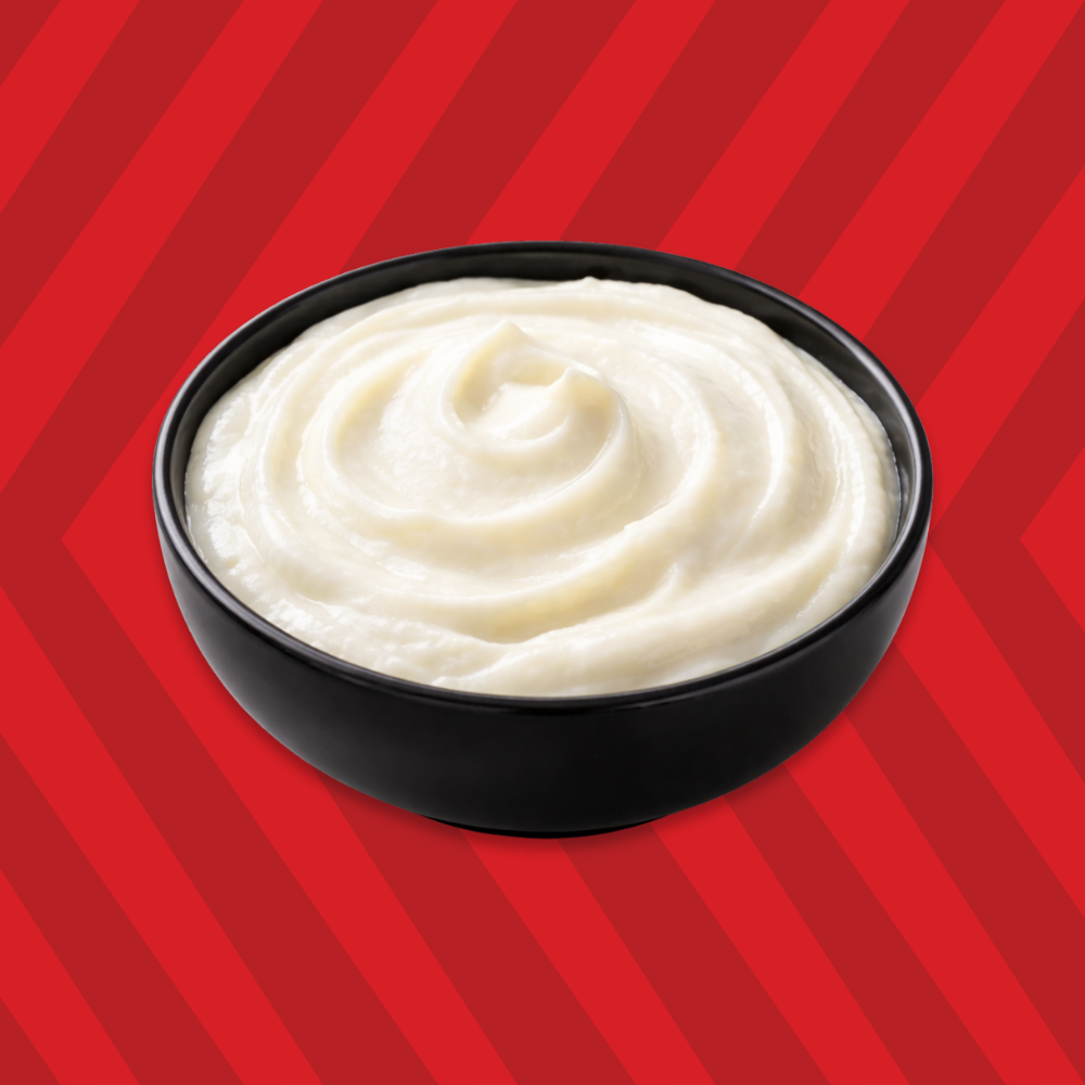 Creamy garlic sauce in a bowl